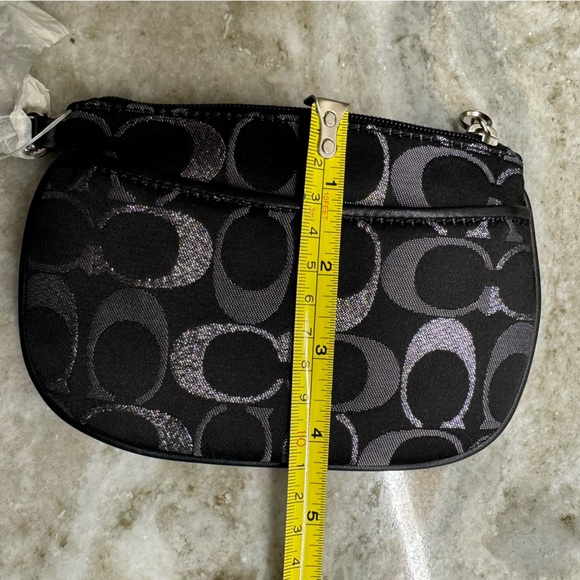 NWT!! Coach wristlet, still in packaging!! Black, silver, and grey. Smoke free - Picture 8 of 9